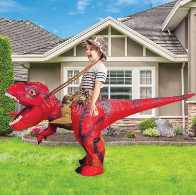 Child wearing a GOOSH inflatable dinosaur rider costume